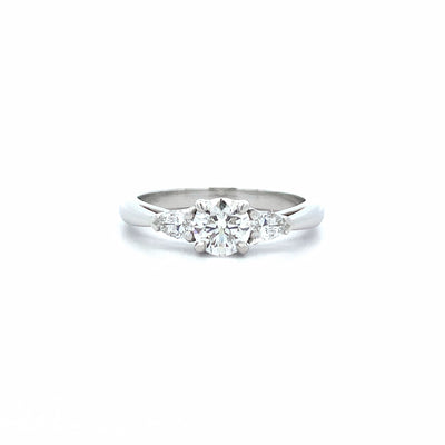 Reflect: Brilliant Cut Diamond Three Stone Ring in Platinum