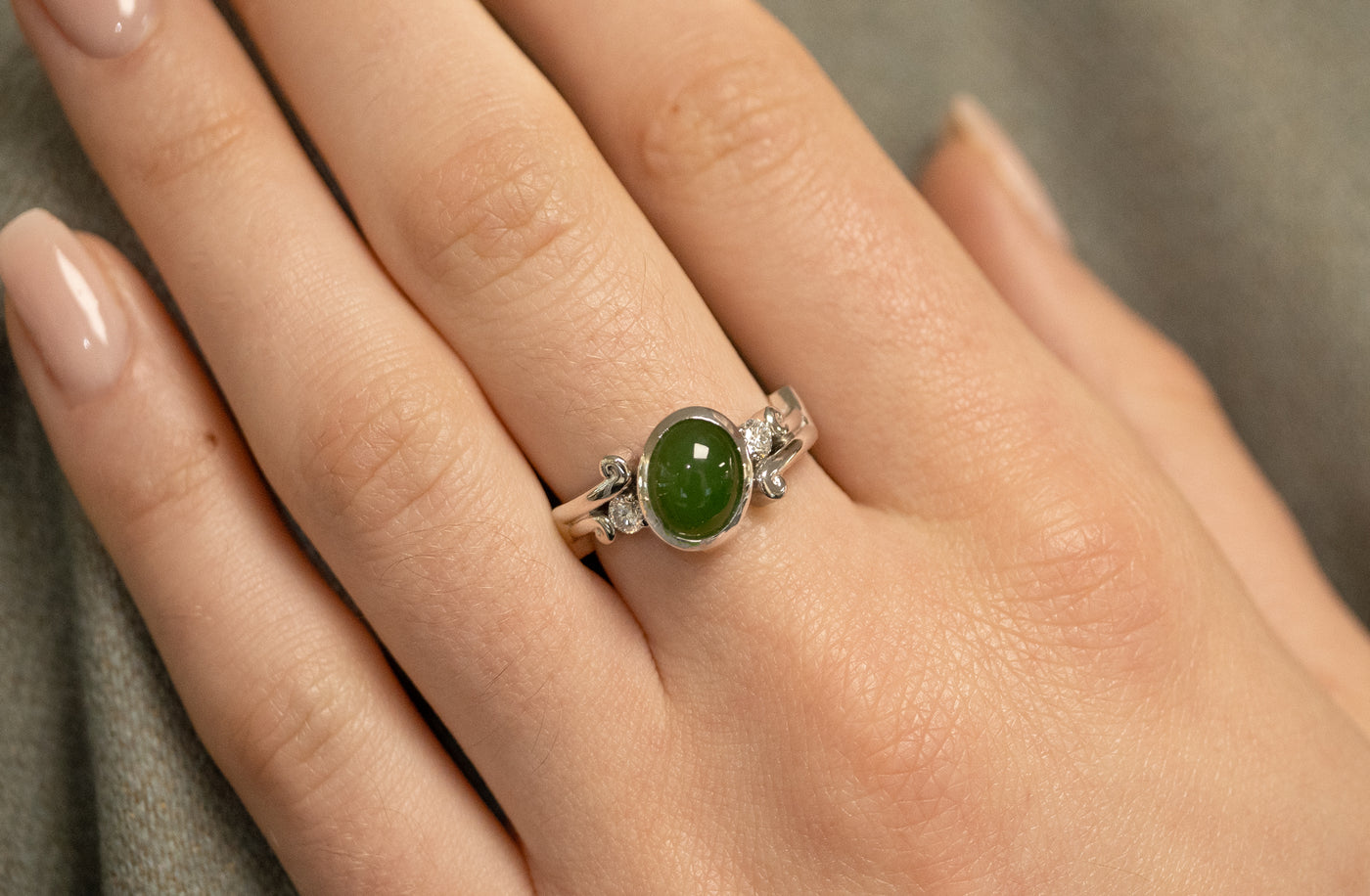 Arahura: Pounamu and Diamond Three Stone Ring in Platinum