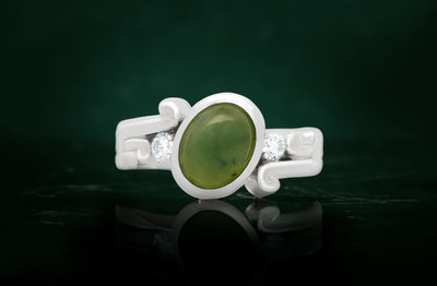 Arahura: Pounamu and Diamond Three Stone Ring in Platinum