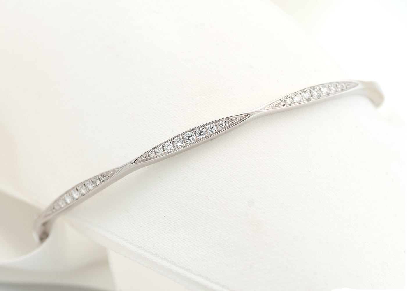 Brilliant Cut Diamond Set Cinched Bangle in White Gold | 0.38ctw