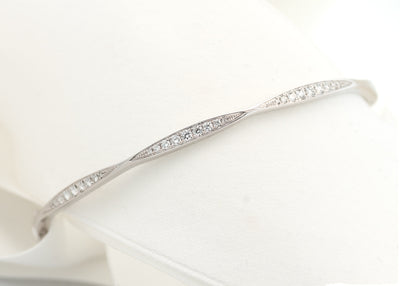 Brilliant Cut Diamond Set Cinched Bangle in White Gold | 0.38ctw