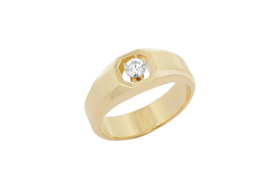 The Floeting Diamond Signet Ring crafted in 18ct yellow gold and titanium, designed for all genders.