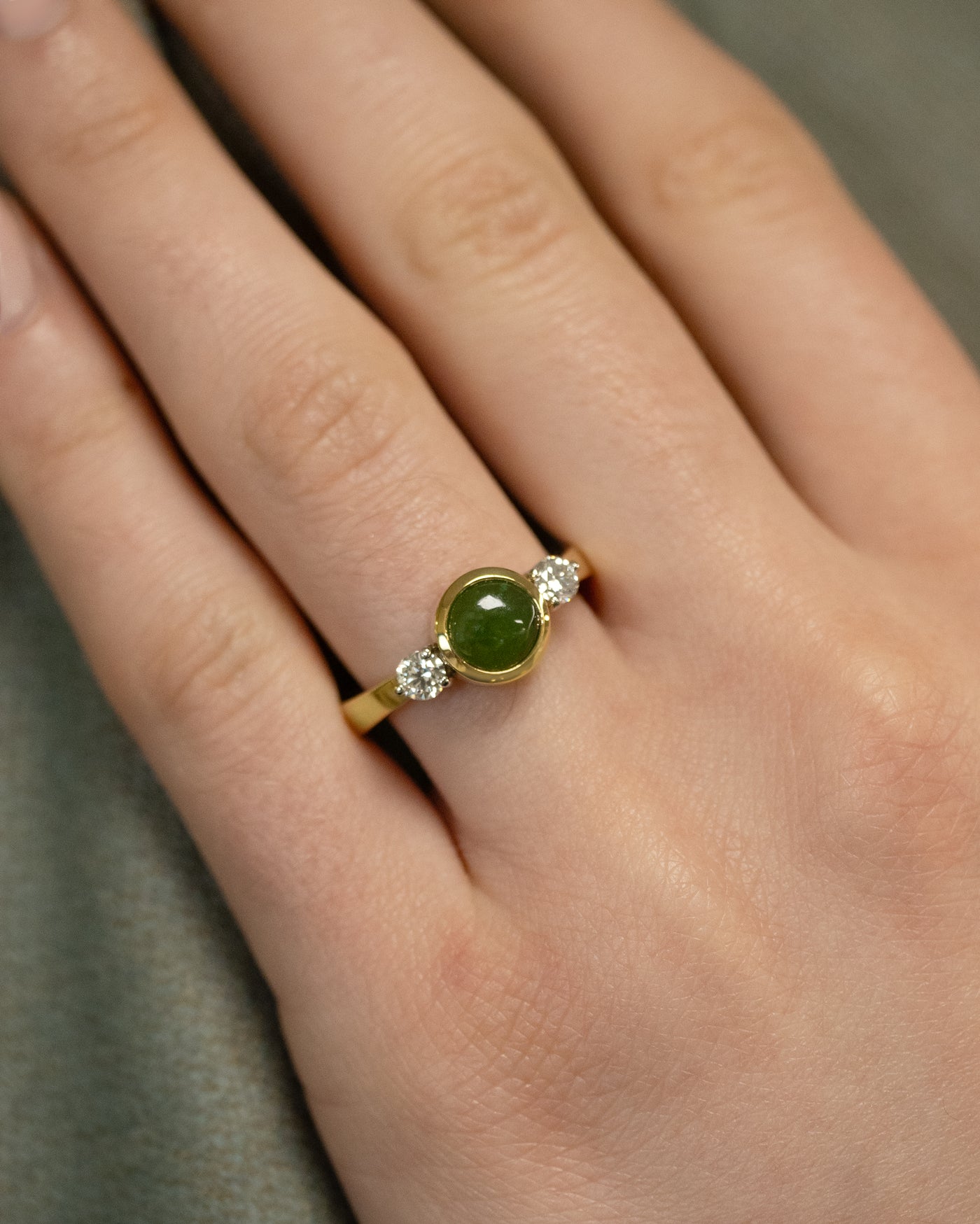 Riversong: Pounamu and Diamond Three Stone Ring in Yellow Gold