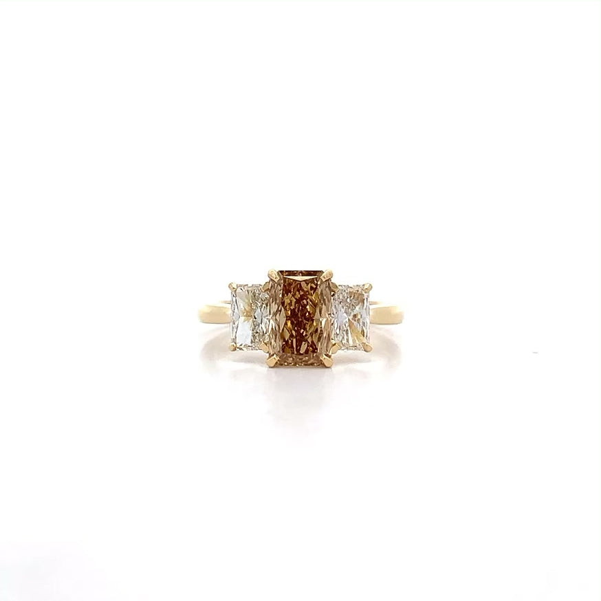 Type 2A Natural Radiant Cut Cognac Diamond Three Stone Ring in Yellow Gold | 2.72ctw