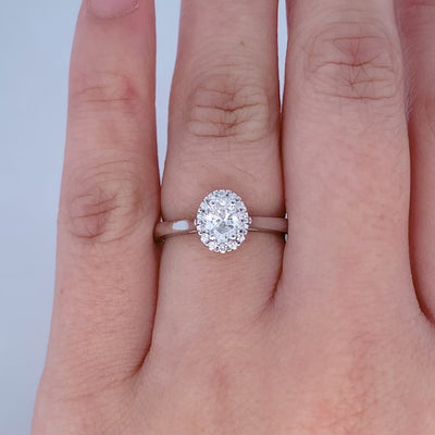 Luminous: Oval Cut Diamond Halo Ring in Platinum | 0.48ctw