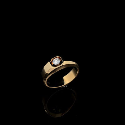 The Floeting Diamond Signet Ring crafted in 18ct yellow gold and titanium that is designed for all genders